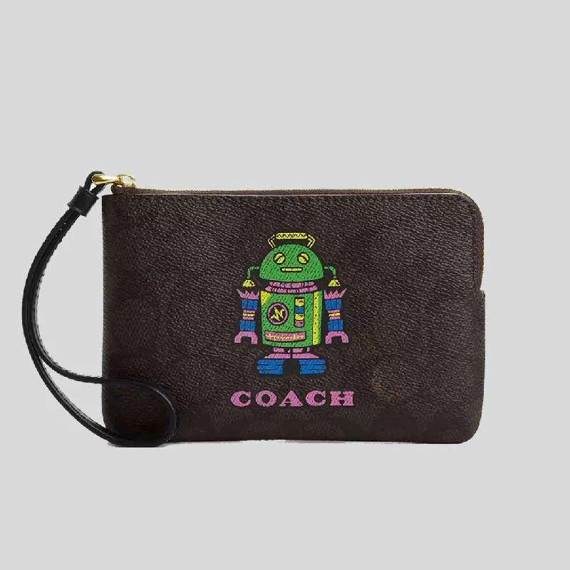 COACH Corner Zip Wristlet In Signature Canvas With Robot Print CW868